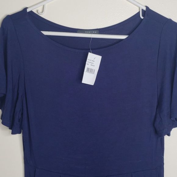 Flutter Sleeve Pocket Dress - Picture 3 of 5